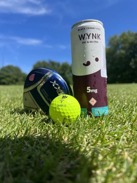 Wynk and a golf club